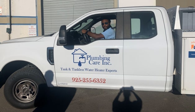 Plumber in Plumbing care Inc. Vehicle